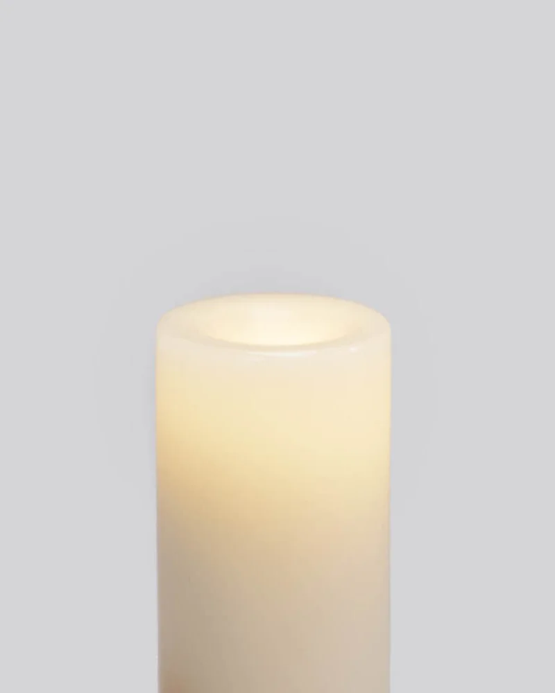 Close-up of the actual wax rim glowing around a Context candle’s LED
